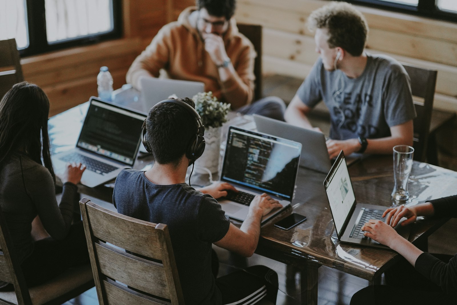 Team collaborating on strategy in a modern workspace